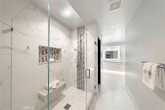 bathroom with recessed lighting, visible vents, a shower stall, and baseboards
