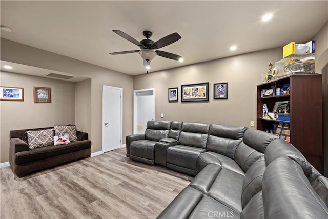 living area featuring recessed lighting, ceiling fan, wood finished floors, and baseboards