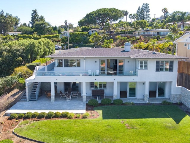 43 Avenida Corona, Rancho Palos Verdes, CA 90275 - rear view of property with a patio, stairway, a lawn, a chimney, and stucco siding