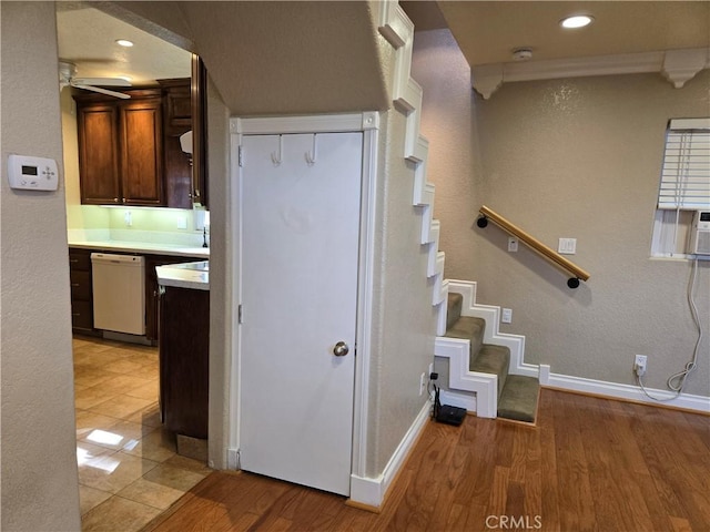 443 Hartman Cir, Cedarpines Park, CA 92322 - stairway with wood finished floors, baseboards, a textured wall, and recessed lighting
