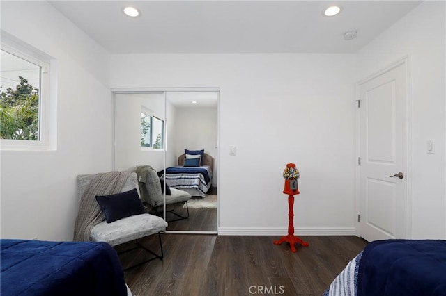bedroom featuring recessed lighting, baseboards, and wood finished floors