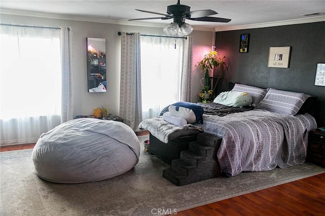 27069 Dawnview Ct, Corona, CA 92883 - bedroom with ornamental molding, visible vents, and wood finished floors