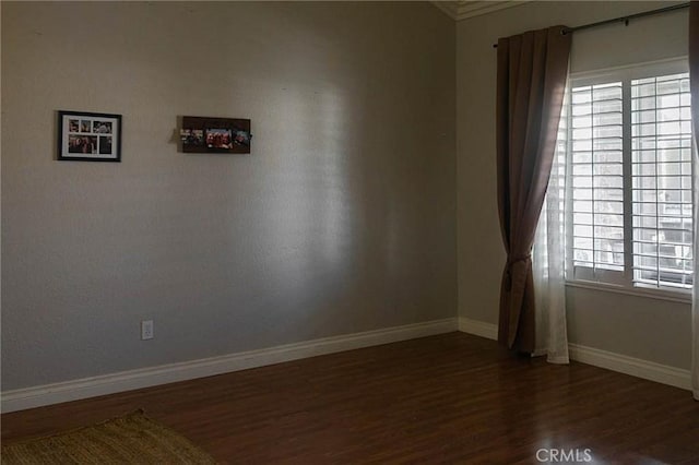 27069 Dawnview Ct, Corona, CA 92883 - empty room with ornamental molding, wood finished floors, and baseboards