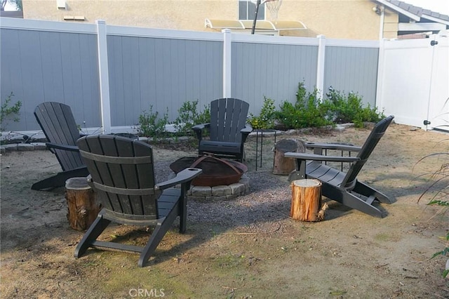 27069 Dawnview Ct, Corona, CA 92883 - view of patio with fence and a fire pit