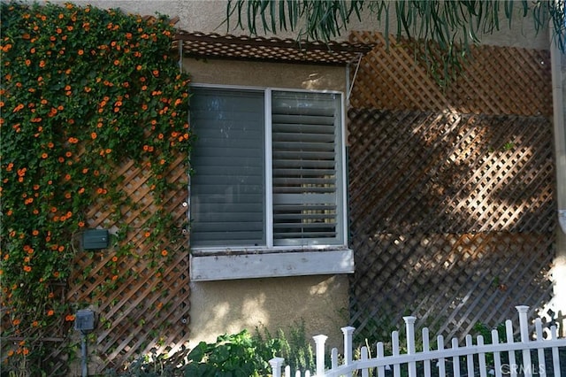 27069 Dawnview Ct, Corona, CA 92883 - details with stucco siding and fence