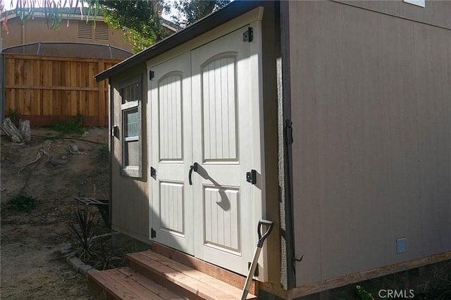 27069 Dawnview Ct, Corona, CA 92883 - view of outdoor structure featuring fence, an outdoor structure, and entry steps