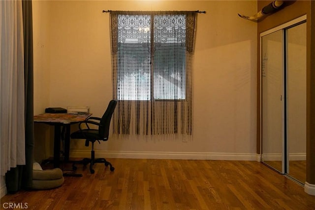 27069 Dawnview Ct, Corona, CA 92883 - home office with baseboards and wood finished floors