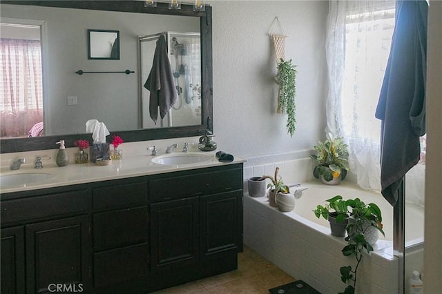 27069 Dawnview Ct, Corona, CA 92883 - ensuite bathroom featuring a garden tub, plenty of natural light, and a sink