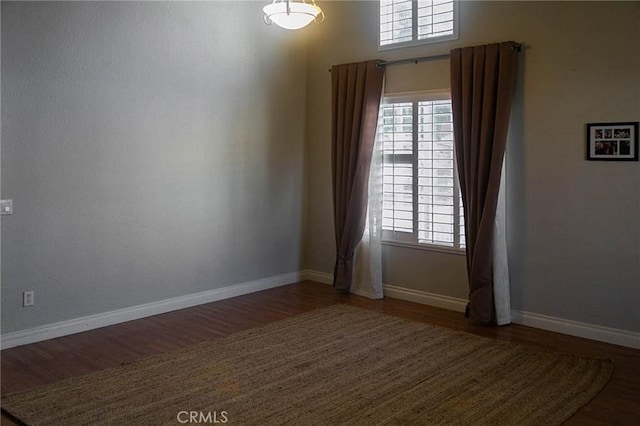 27069 Dawnview Ct, Corona, CA 92883 - unfurnished room with wood finished floors and baseboards