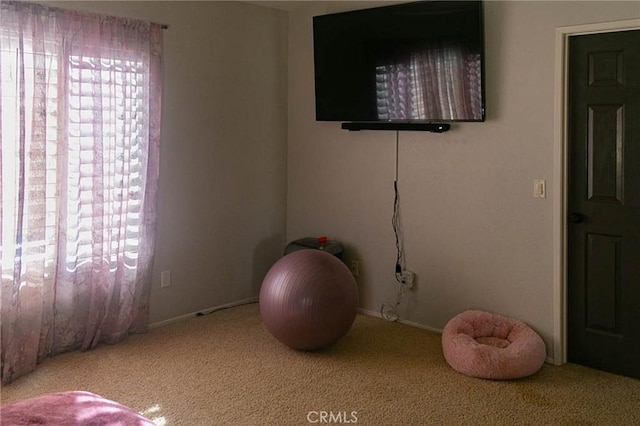 27069 Dawnview Ct, Corona, CA 92883 - workout area featuring a healthy amount of sunlight, baseboards, and carpet floors