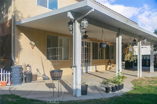 27069 Dawnview Ct, Corona, CA 92883 - rear view of property featuring a patio, fence, ceiling fan, and stucco siding