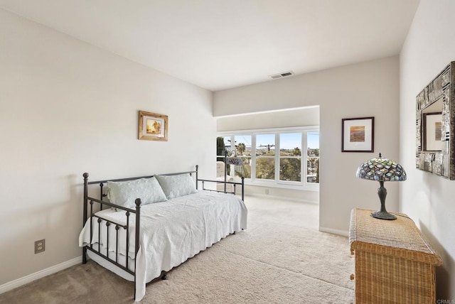 8140 Pasadena Ave, La Mesa, CA 91941 - carpeted bedroom with baseboards and visible vents