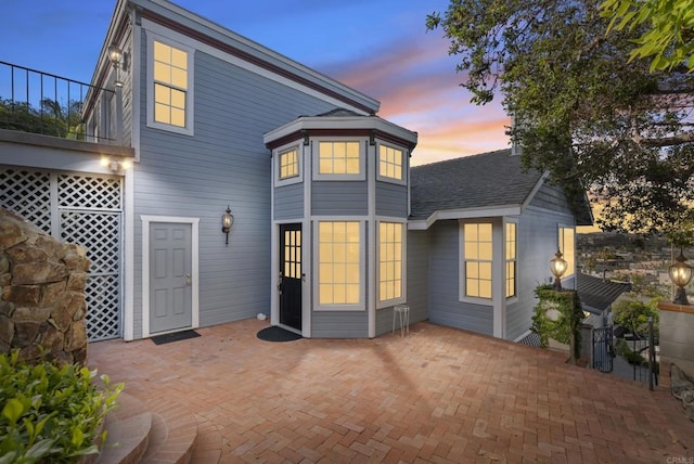 8140 Pasadena Ave, La Mesa, CA 91941 - back of house at dusk with a patio area