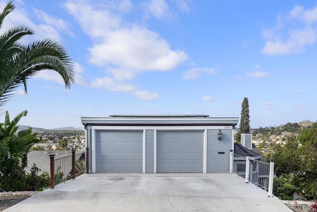 8140 Pasadena Ave, La Mesa, CA 91941 - detached garage with roof mounted solar panels and fence