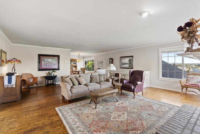 8140 Pasadena Ave, La Mesa, CA 91941 - living area with baseboards, an inviting chandelier, crown molding, and wood finished floors