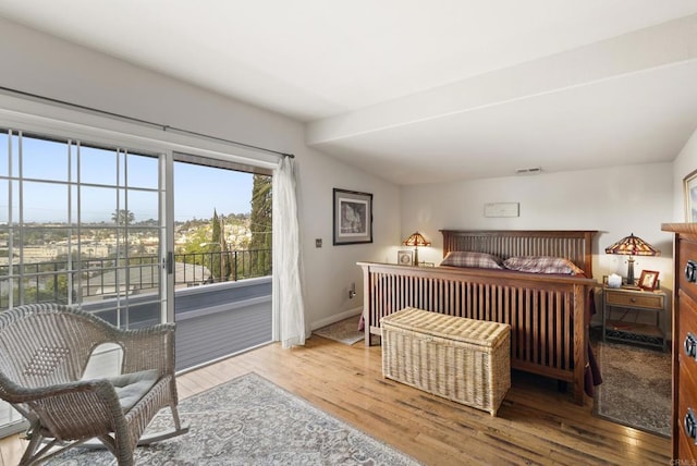 8140 Pasadena Ave, La Mesa, CA 91941 - bedroom with baseboards, wood finished floors, visible vents, and access to exterior