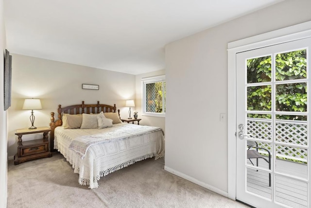 8140 Pasadena Ave, La Mesa, CA 91941 - carpeted bedroom featuring baseboards and multiple windows