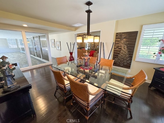 dining area with visible vents, hardwood / wood-style floors, recessed lighting, and baseboards