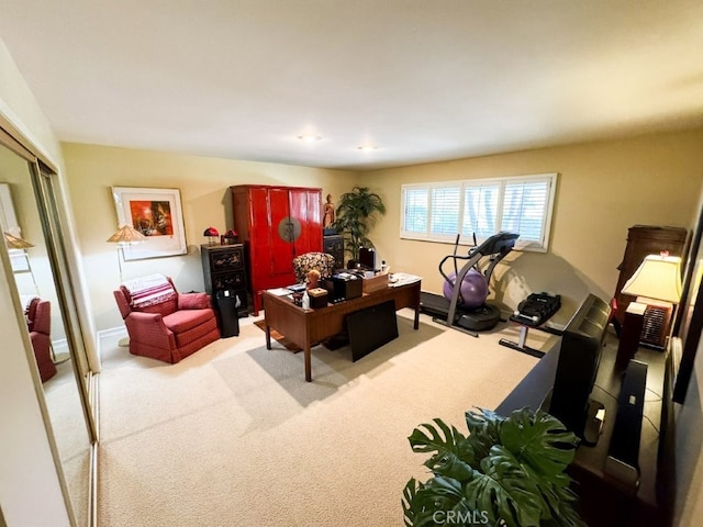 home office with baseboards and carpet floors