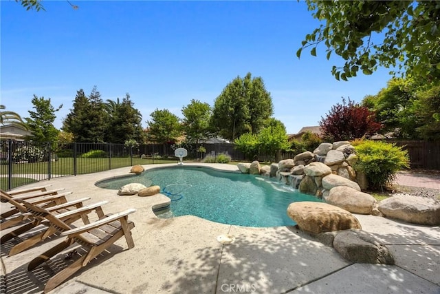 view of swimming pool with a fenced in pool, a patio, and a fenced backyard