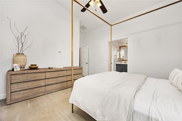 bedroom with visible vents, connected bathroom, a ceiling fan, and light carpet
