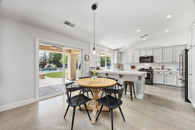 dining room featuring lofted ceiling, visible vents, recessed lighting, and baseboards