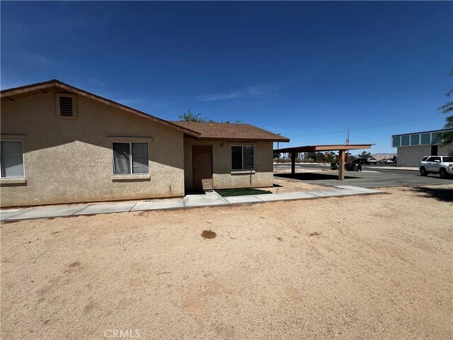6320 Mesquite Ave Unit 29, Palms, CA 92277 - view of front facade featuring stucco siding
