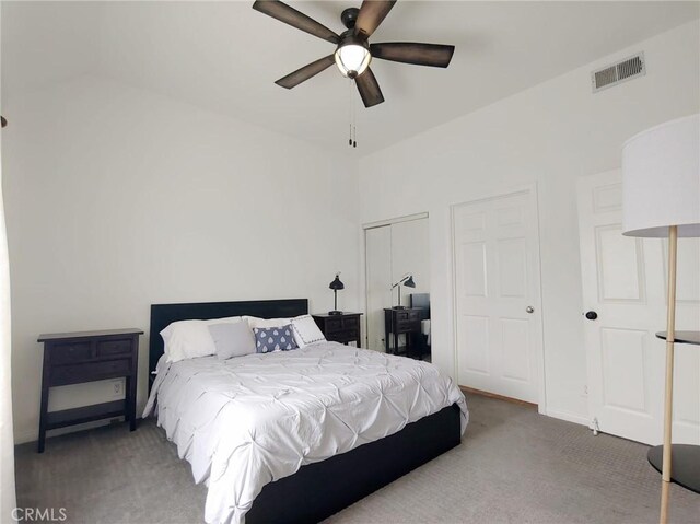 bedroom featuring carpet flooring, a closet, and ceiling fan