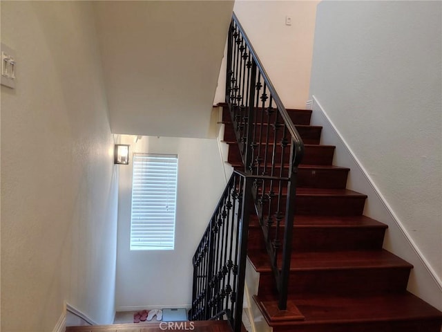 staircase with baseboards