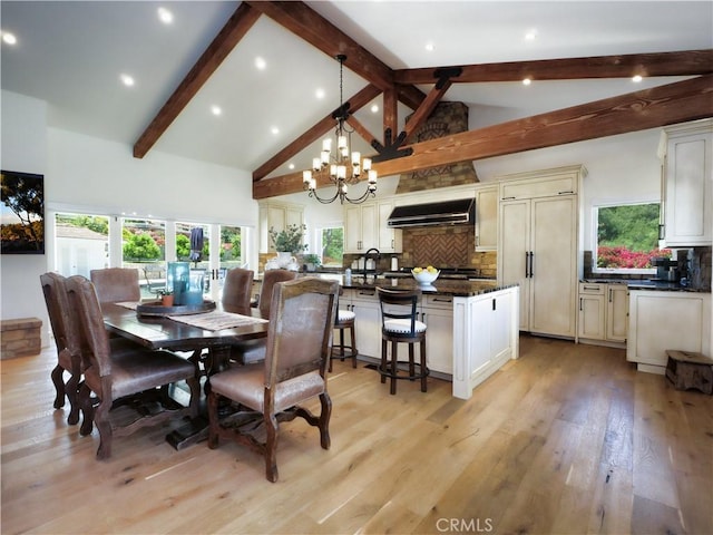 3 Poppy Trl, Rolling Hills, CA 90274 - dining area with a notable chandelier, a wealth of natural light, and beam ceiling