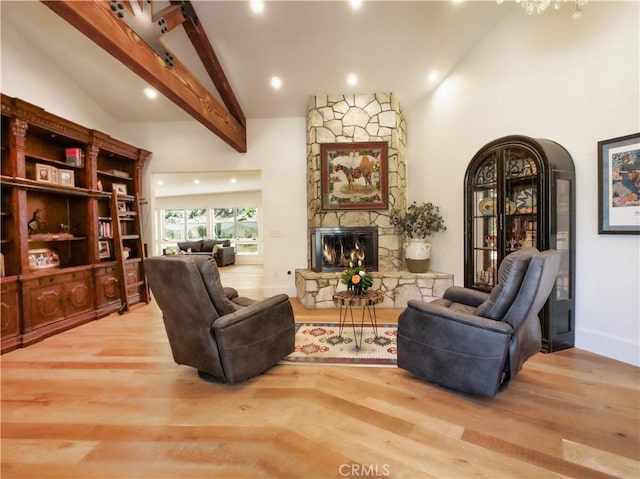 3 Poppy Trl, Rolling Hills, CA 90274 - living room featuring recessed lighting, high vaulted ceiling, wood finished floors, and a fireplace