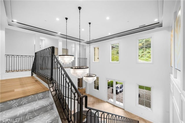 staircase featuring recessed lighting