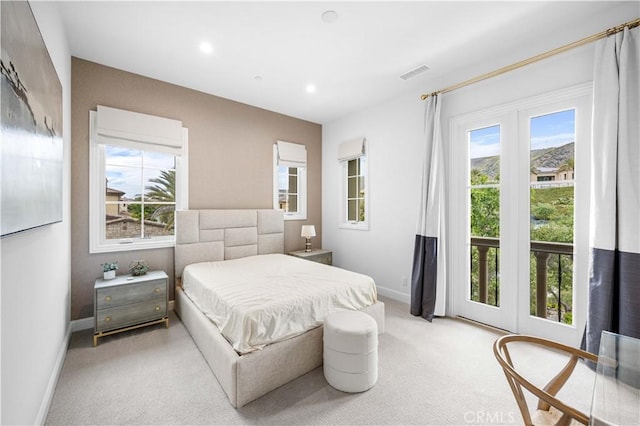 bedroom with carpet floors, recessed lighting, baseboards, and visible vents