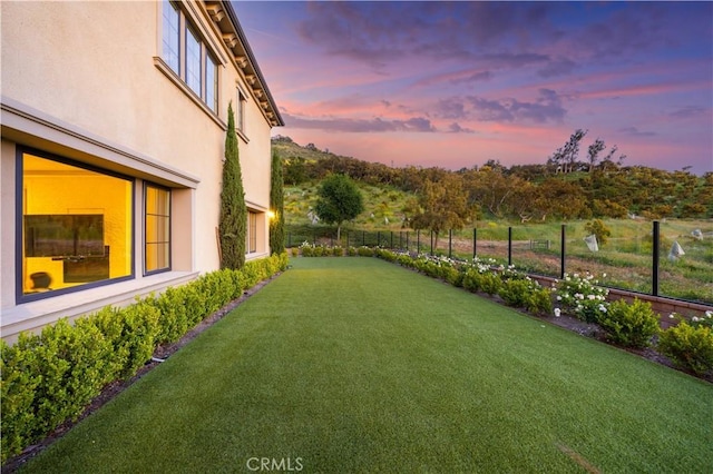 view of yard featuring fence