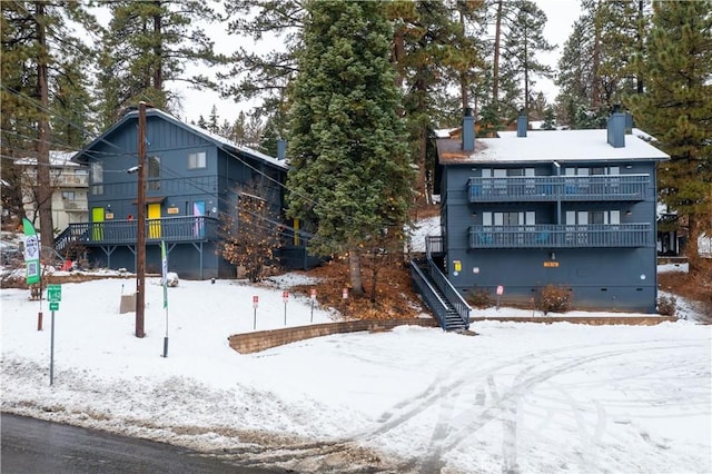 1288 Clubview Dr, Big Bear Lake, CA 92315 - view of front of property featuring crawl space, stairs, a chimney, and a balcony