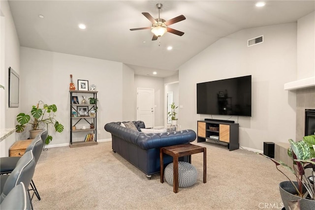 living area with recessed lighting, ceiling fan, visible vents, vaulted ceiling, and light colored carpet
