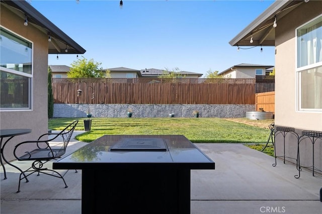 2958 Beaumont Ave, Chico, CA 95928 - view of patio / terrace with a fenced backyard and an outdoor fire pit