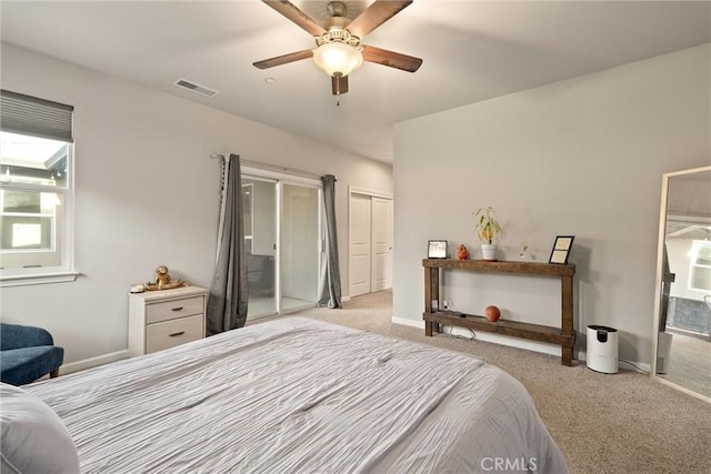 2958 Beaumont Ave, Chico, CA 95928 - bedroom with a ceiling fan, multiple windows, carpet flooring, and visible vents