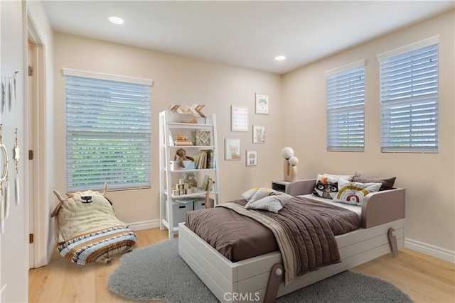 33827 Flora Springs St, Temecula, CA 92592 - bedroom with wood finished floors and recessed lighting
