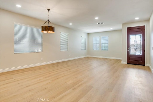 33827 Flora Springs St, Temecula, CA 92592 - foyer with light wood-style floors and recessed lighting
