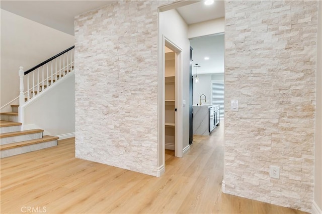 33827 Flora Springs St, Temecula, CA 92592 - stairway featuring wood finished floors