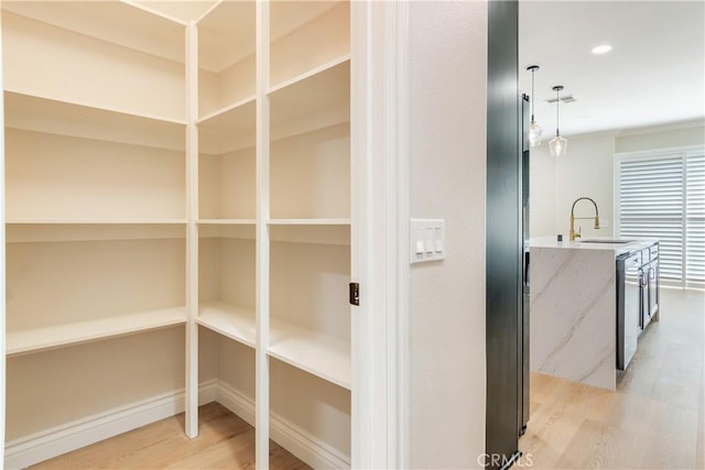 33827 Flora Springs St, Temecula, CA 92592 - storage area featuring a sink