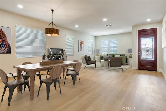 33827 Flora Springs St, Temecula, CA 92592 - dining room with light wood finished floors and recessed lighting
