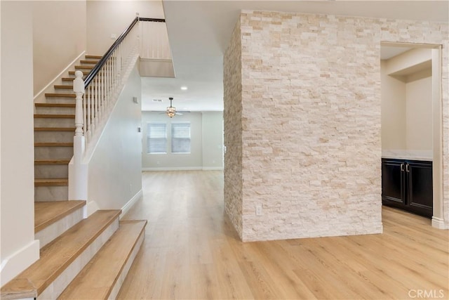 33827 Flora Springs St, Temecula, CA 92592 - stairway with a ceiling fan and wood finished floors