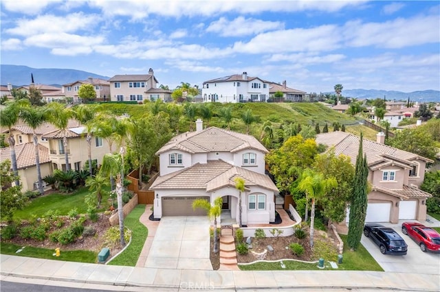 33827 Flora Springs St, Temecula, CA 92592 - aerial view of residential area featuring a mountainous background