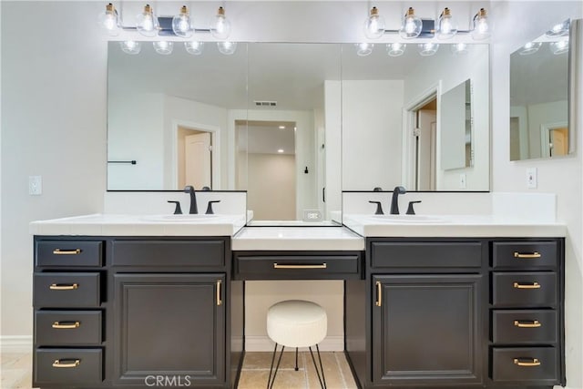 33827 Flora Springs St, Temecula, CA 92592 - bathroom featuring double vanity and tile patterned floors