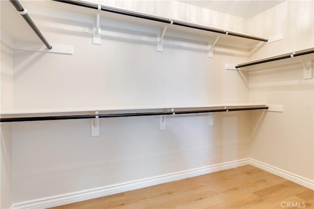 33827 Flora Springs St, Temecula, CA 92592 - spacious closet featuring light wood-style flooring