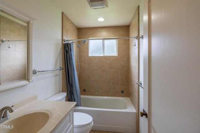 full bathroom featuring visible vents, shower / bath combination with curtain, toilet, and vanity