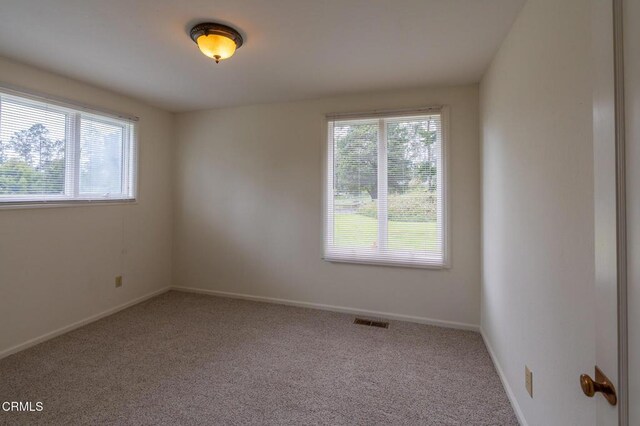 32901 Pearl Dr, Fort Bragg, CA 95437 - carpeted spare room with baseboards and visible vents