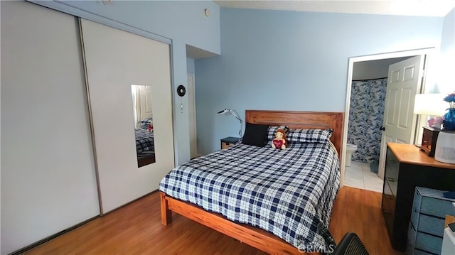 11622 Remington St, Sylmar, CA 91342 - bedroom with wood finished floors, connected bathroom, and a closet